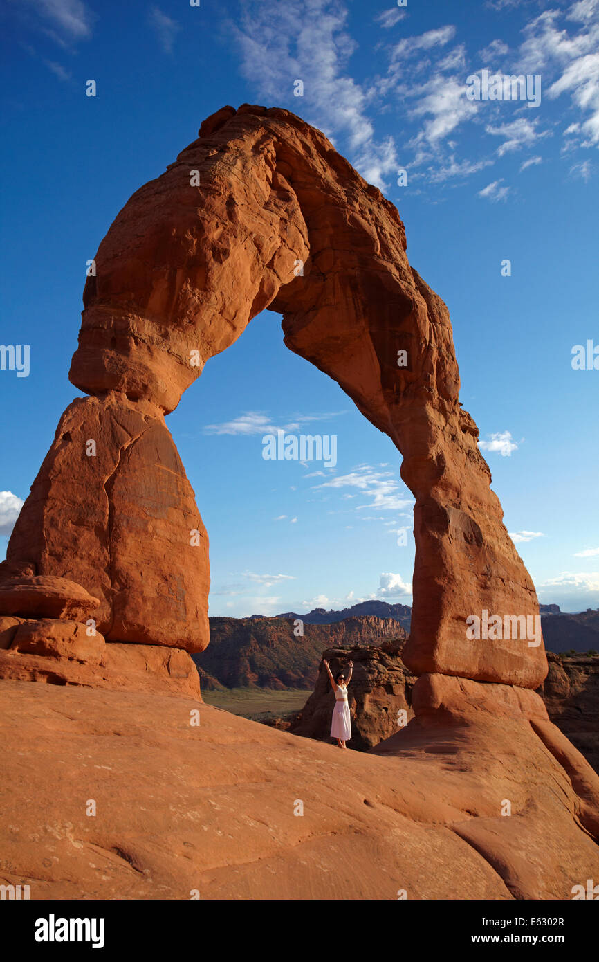 Delicate Arch (65 ft / 20 m tall iconic landmark of Utah), and tourist