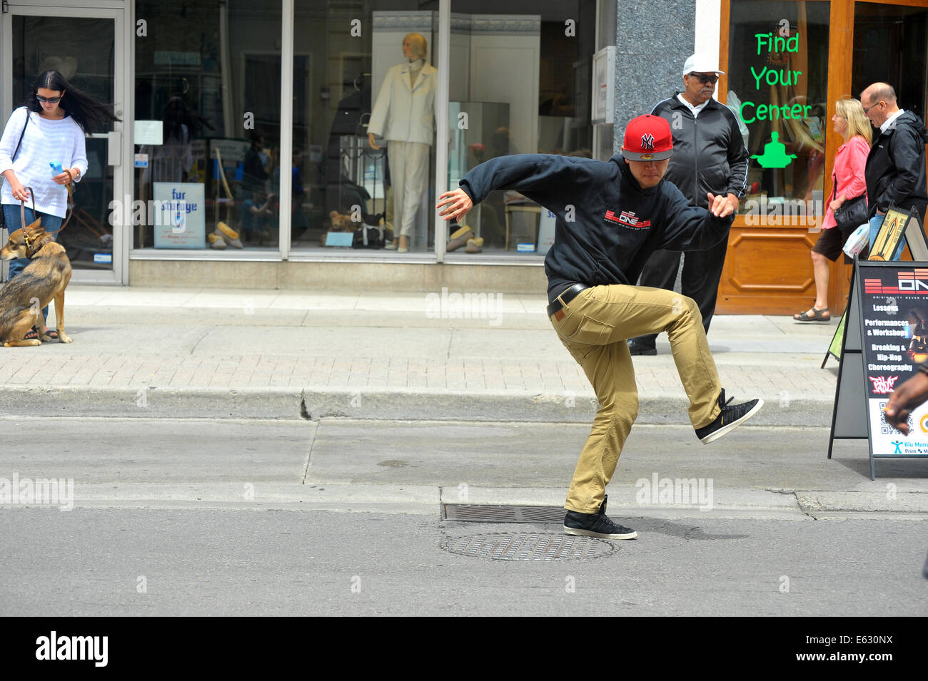 Street artists perform at the Dundas street festival held in London, Ontario in Canada. Stock Photo