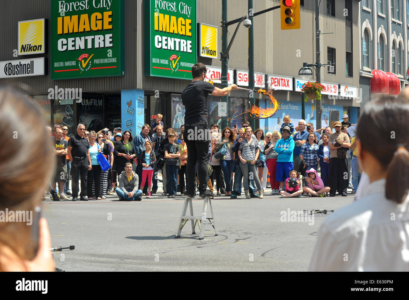Street artists perform at the Dundas street festival held in London, Ontario in Canada. Stock Photo