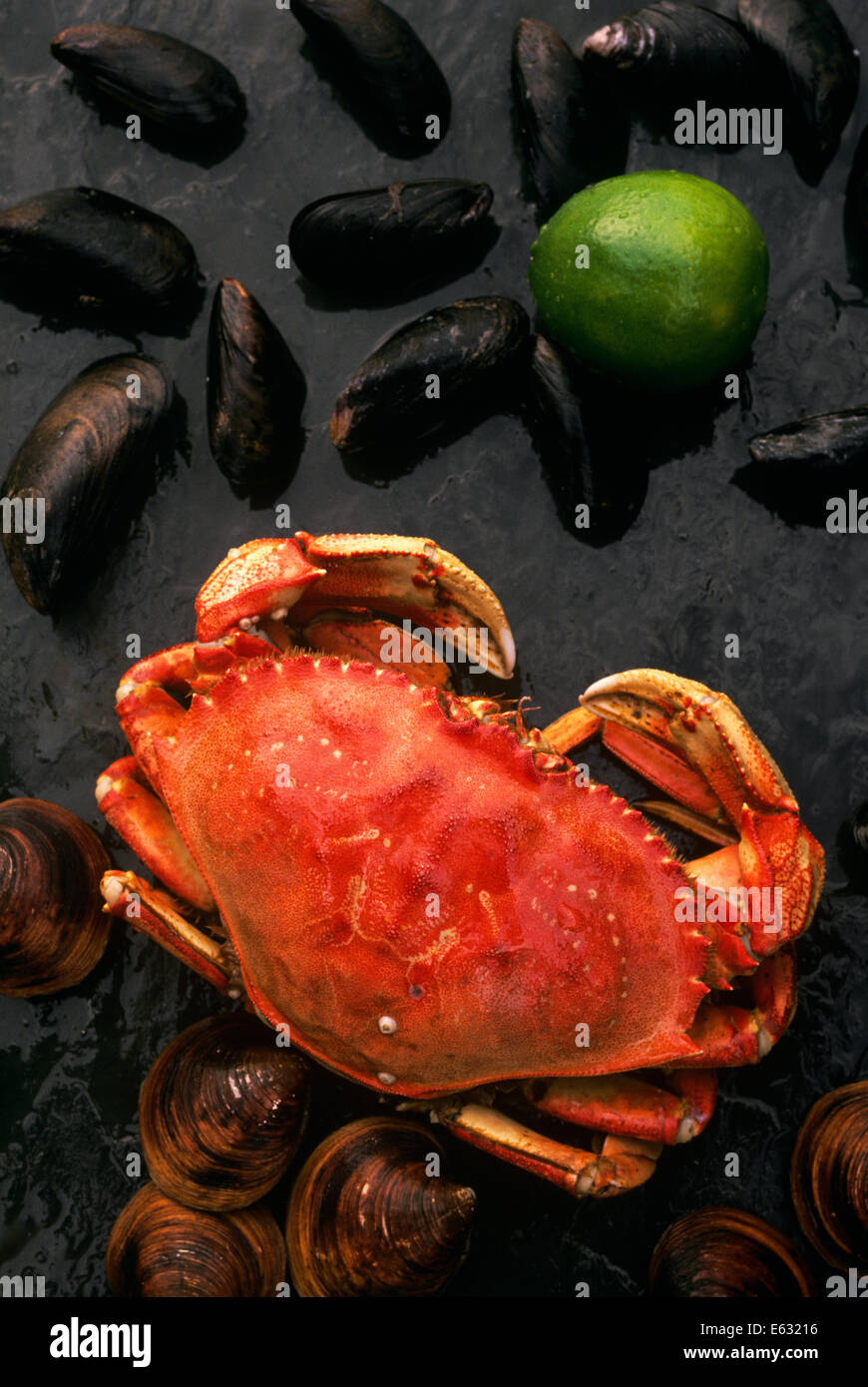 1980s SEAFOOD BOIL MIX WITH CRAB MUSCLES CLAMS AND WHOLE LIME Stock