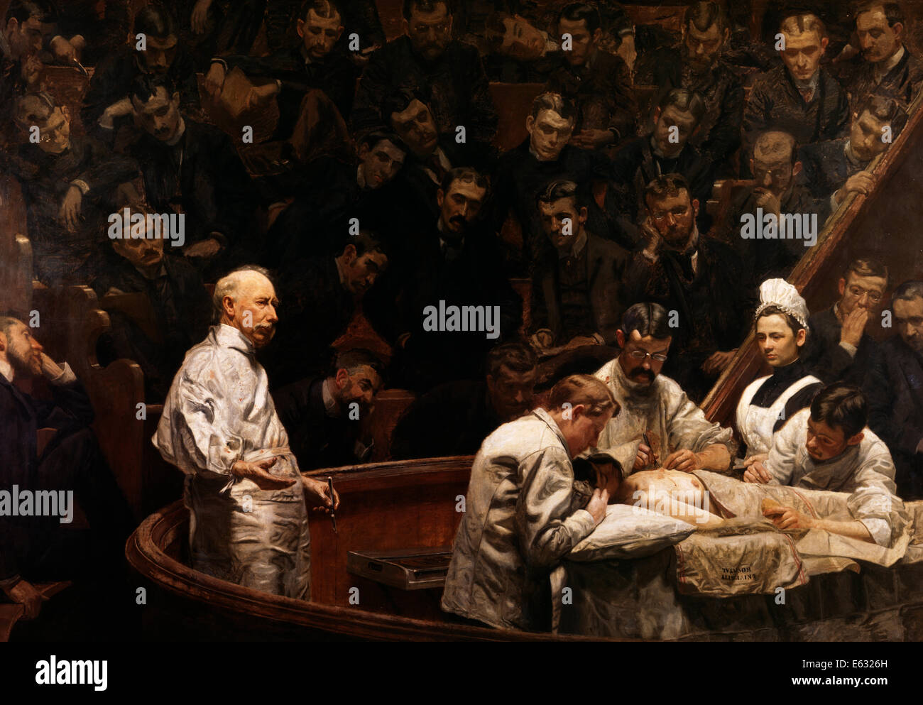 1890s THE AGNEW CLINIC PAINTING BY THOMAS EAKINS CLASS OF MEDICAL STUDENTS OBSERVING SURGERY BY SENIOR PHYSICIAN Stock Photo