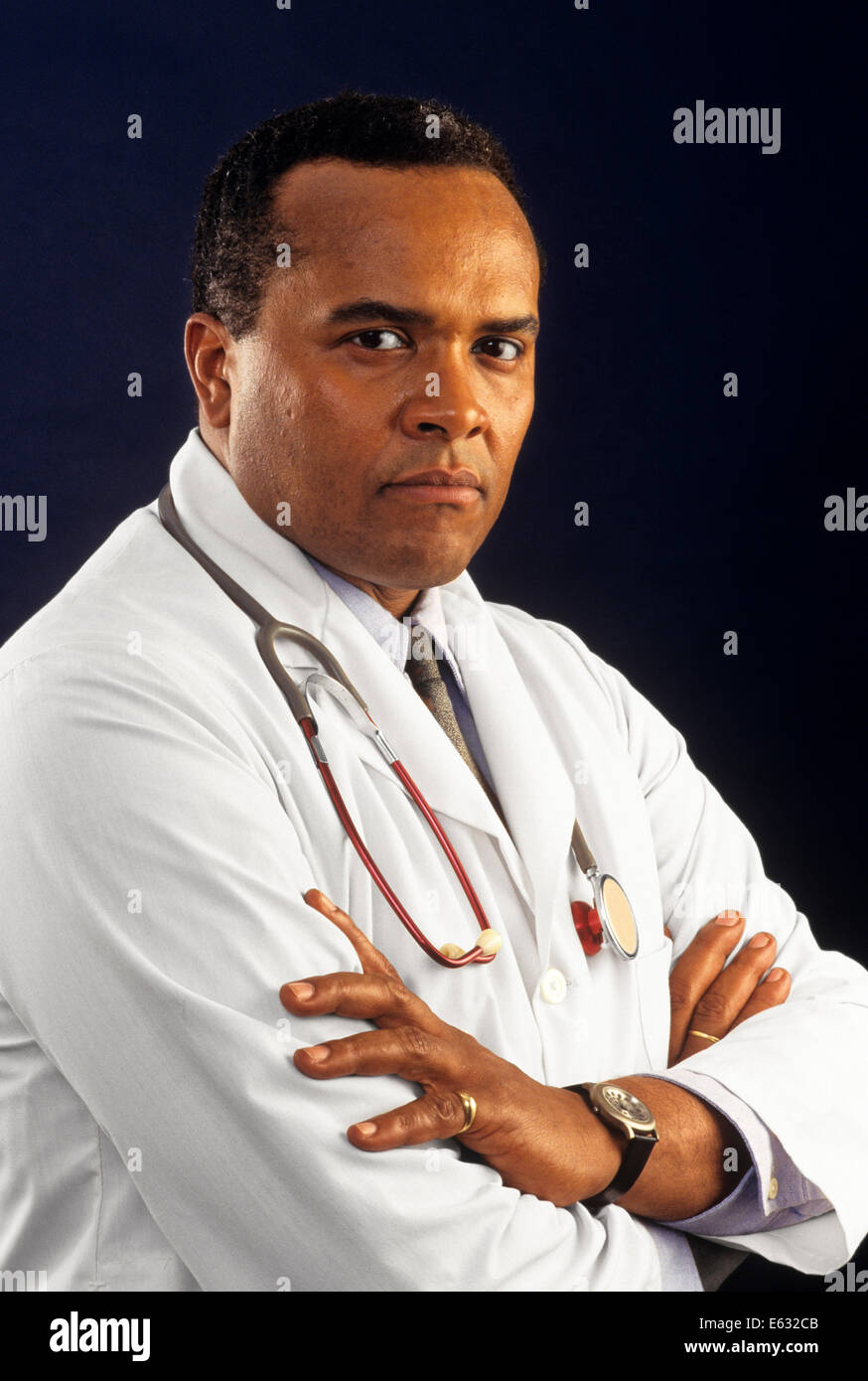 1990s AFRICAN AMERICAN DOCTOR WITH STETHOSCOPE AROUND HIS NECK LOOKING ...
