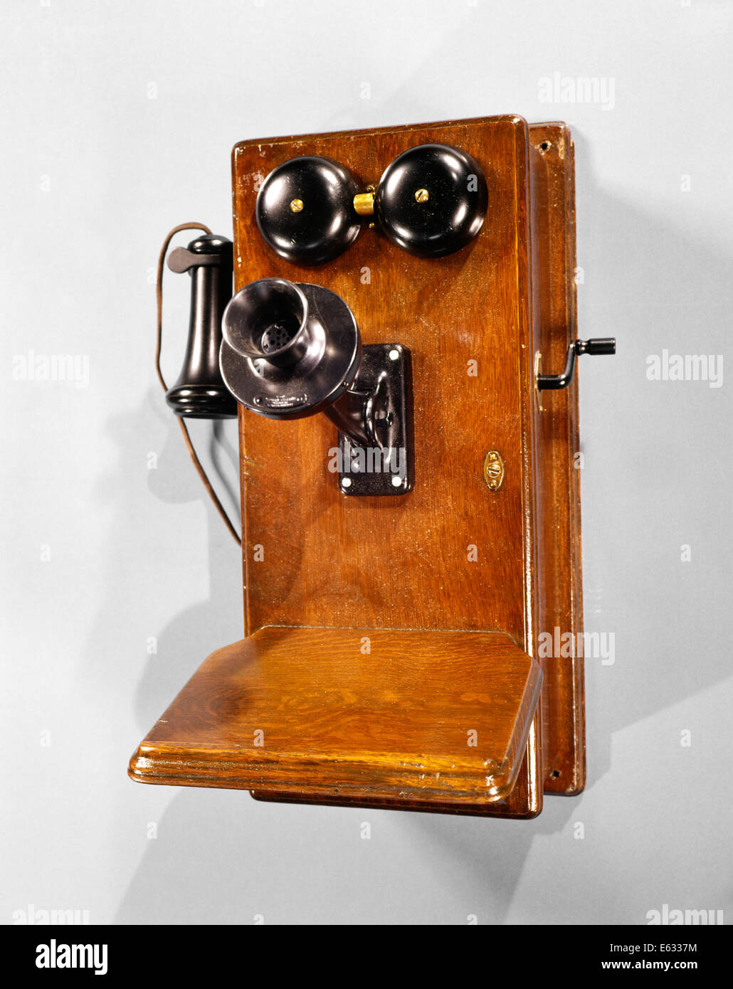 1910s ANTIQUE WOODEN WALL TELEPHONE Stock Photo