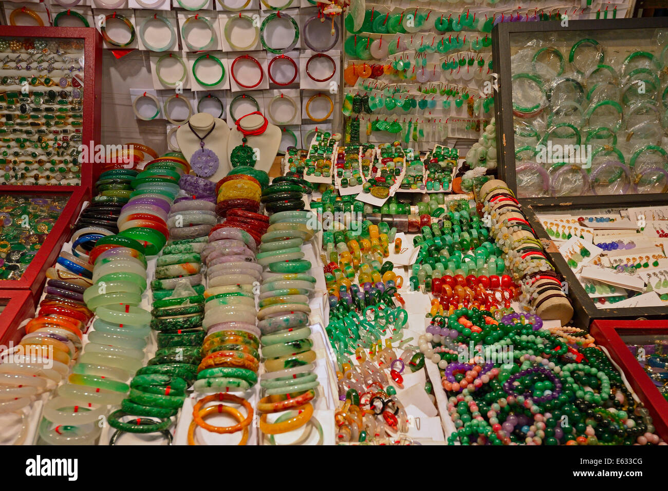 Various pieces of jewelry made of jade in the Jade Market, Kowloon, Hong Kong, China Stock Photo