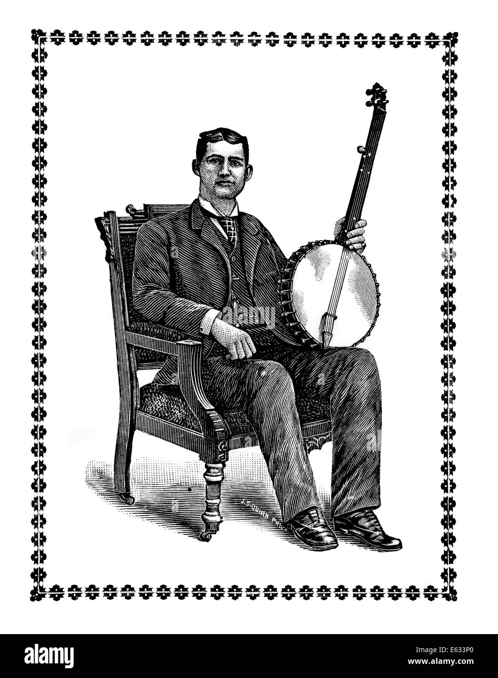 1800s 1890s MAN SITTING IN ORNATE WOODEN ARM CHAIR LOOKING AT CAMERA HOLDING A FIVE STRING BANJO Stock Photo