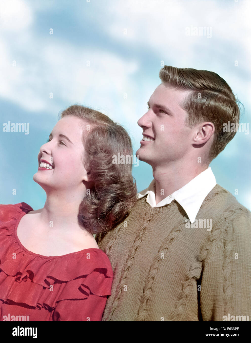 1940s 1950s PORTRAIT PROFILE SMILING TEEN COUPLE Stock Photo
