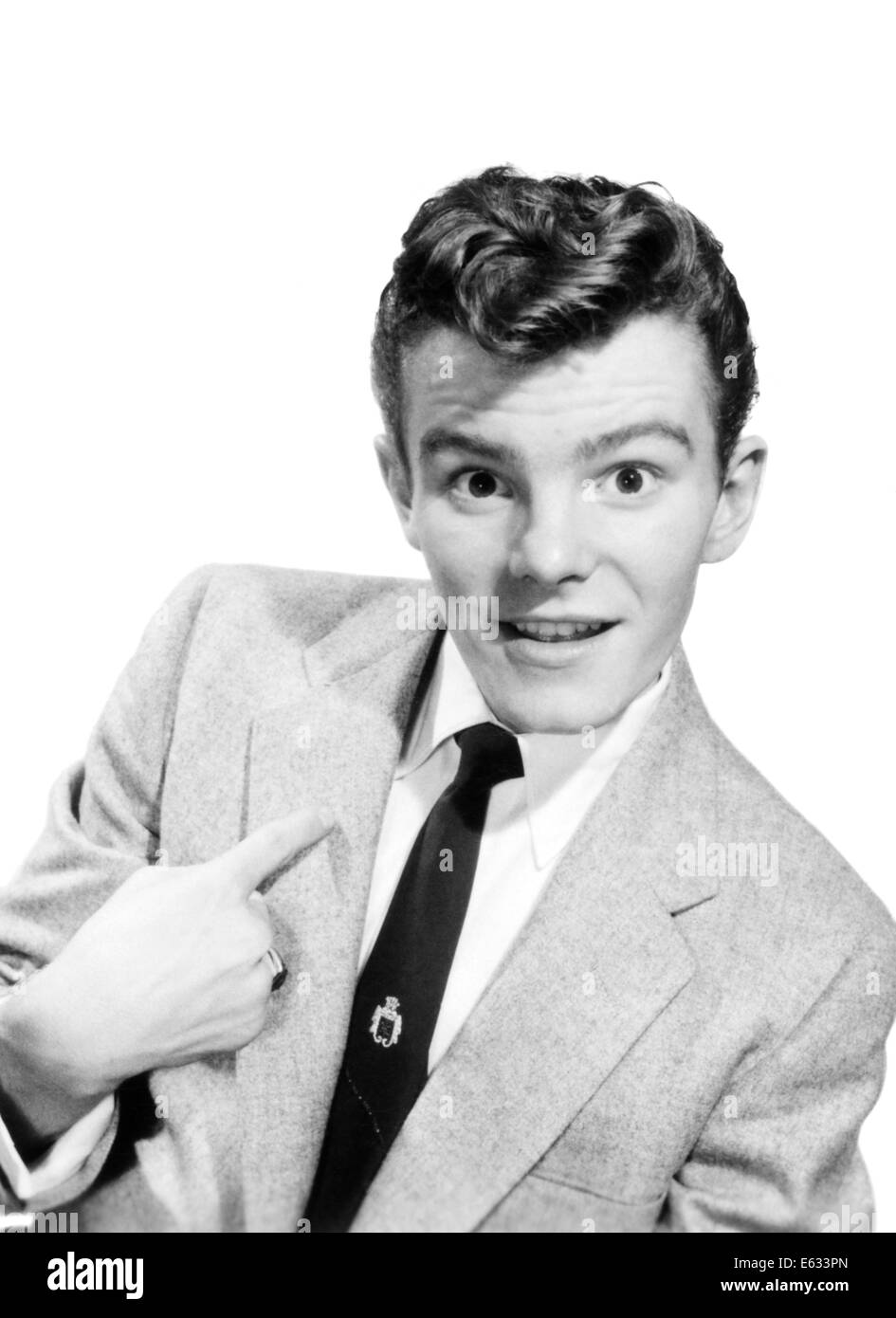 1950s Young Teenage Man Wearing Suit Tie Pointing To Himself Stock