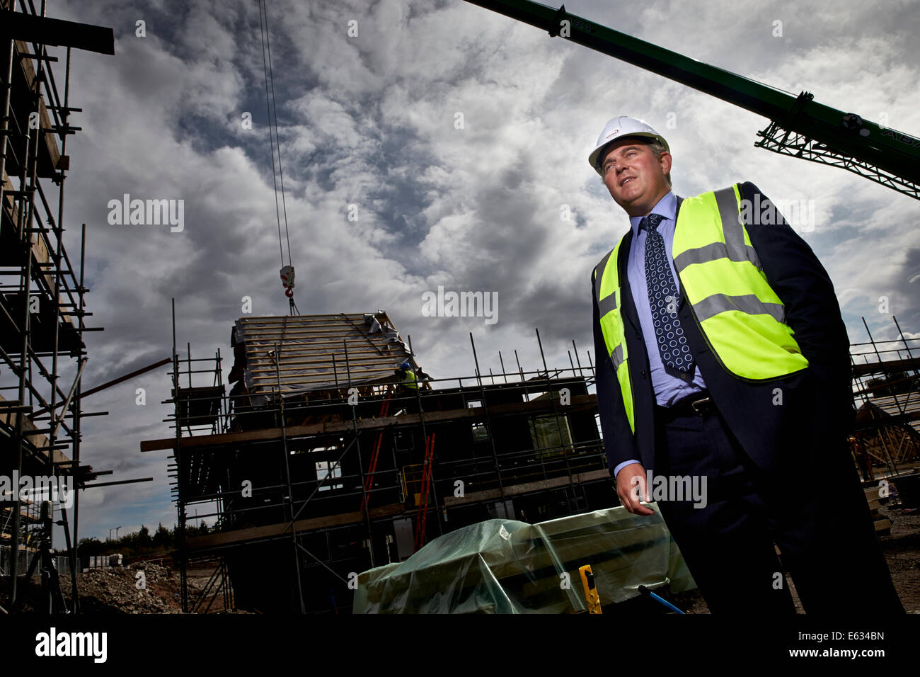 MP Brandon Lewis  Housing and planning minister for the UK government pictured in front of a new housing development. Stock Photo