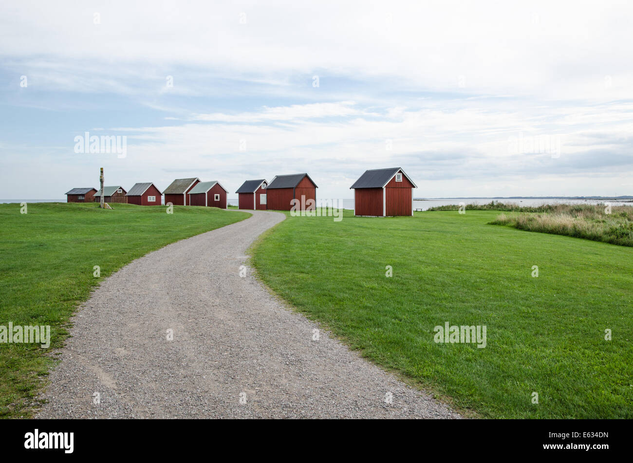 Red cabins at a small fishermens village at the swedish island Oland in the Baltic Sea Stock Photo
