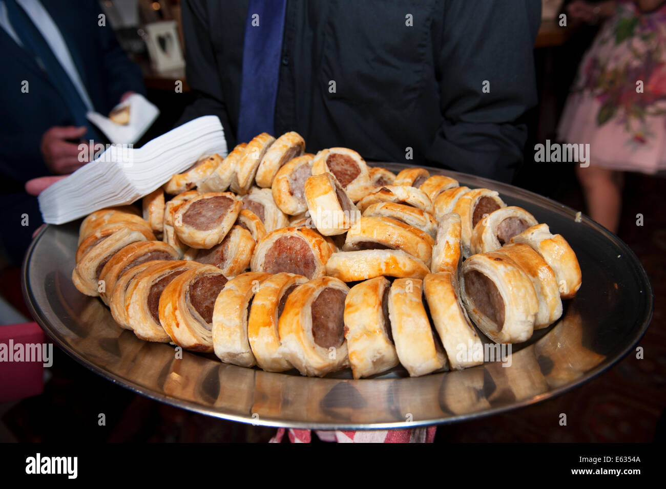 Platter of sausage rolls at a buffet party UK Stock Photo