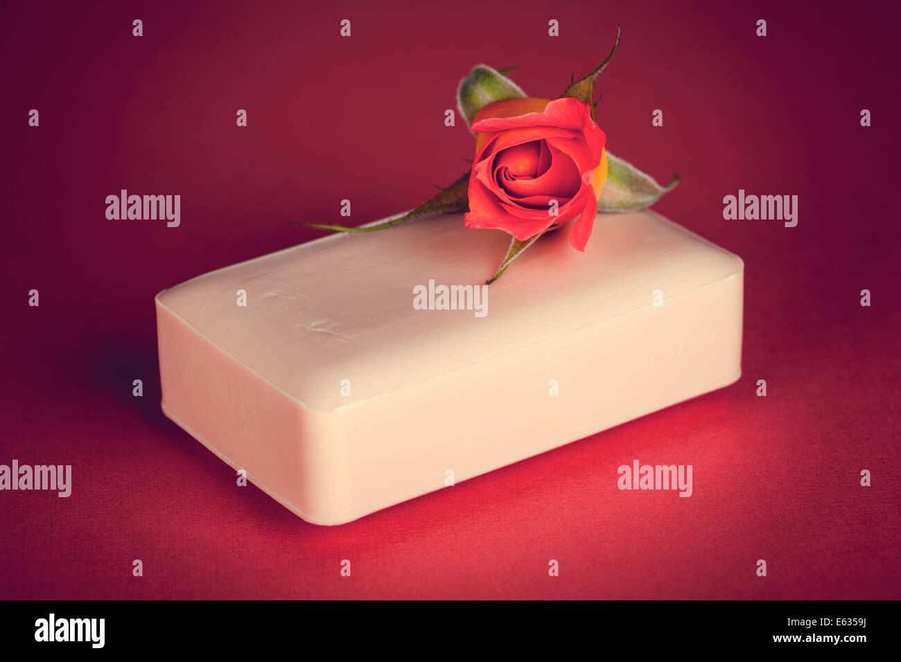 Pink soap with rose flower on pink background Stock Photo