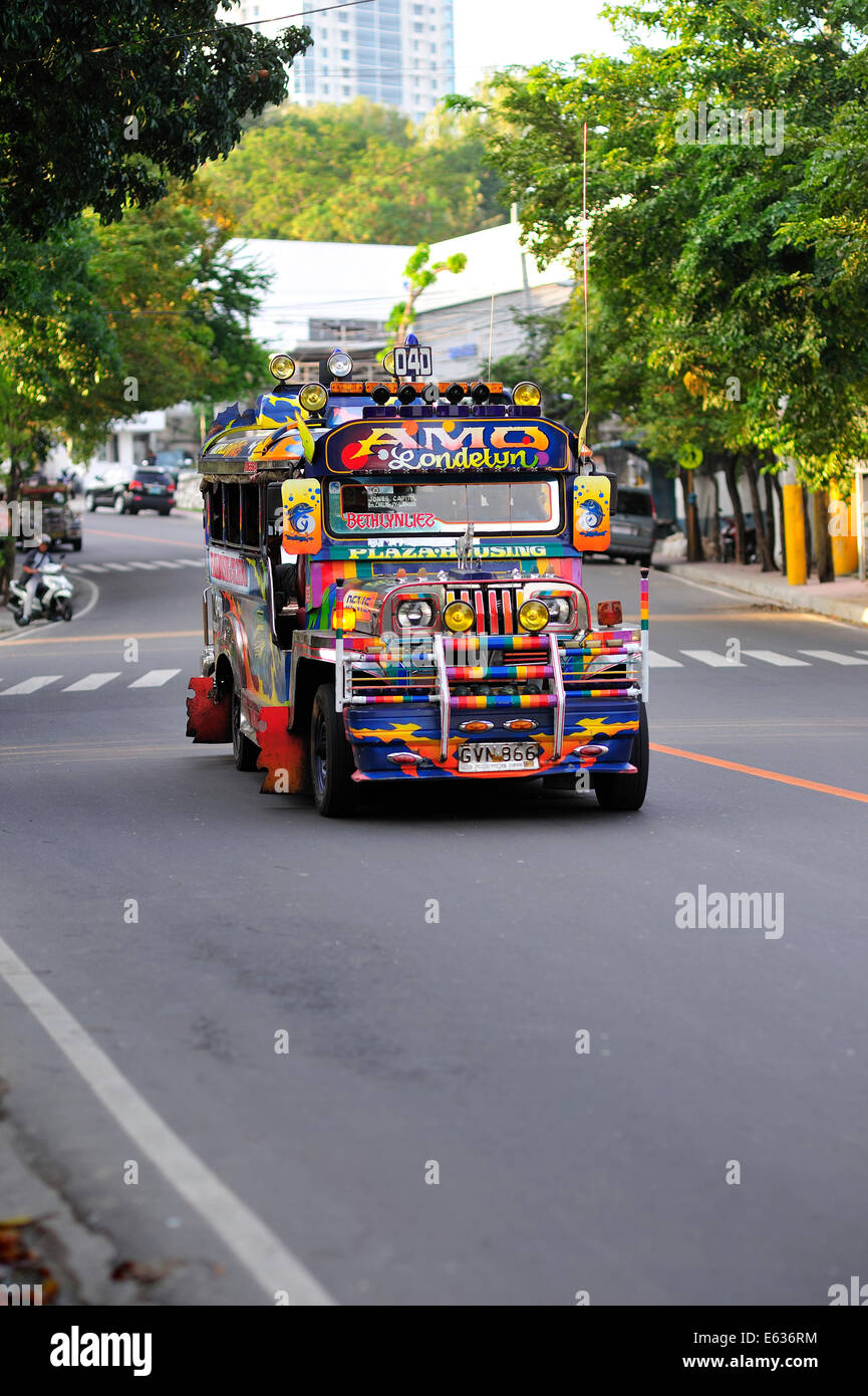 Jeepney traveling into Cebu City Philippines Stock Photo
