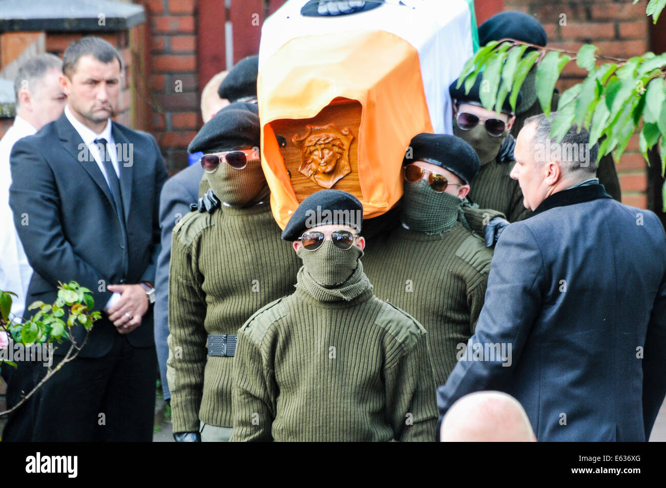 Belfast, Northern Ireland. 13 August 2014. Paramilitary funeral of veteran IRA volunteer Tony Catney Credit:  Stephen Barnes/Alamy Live News Stock Photo