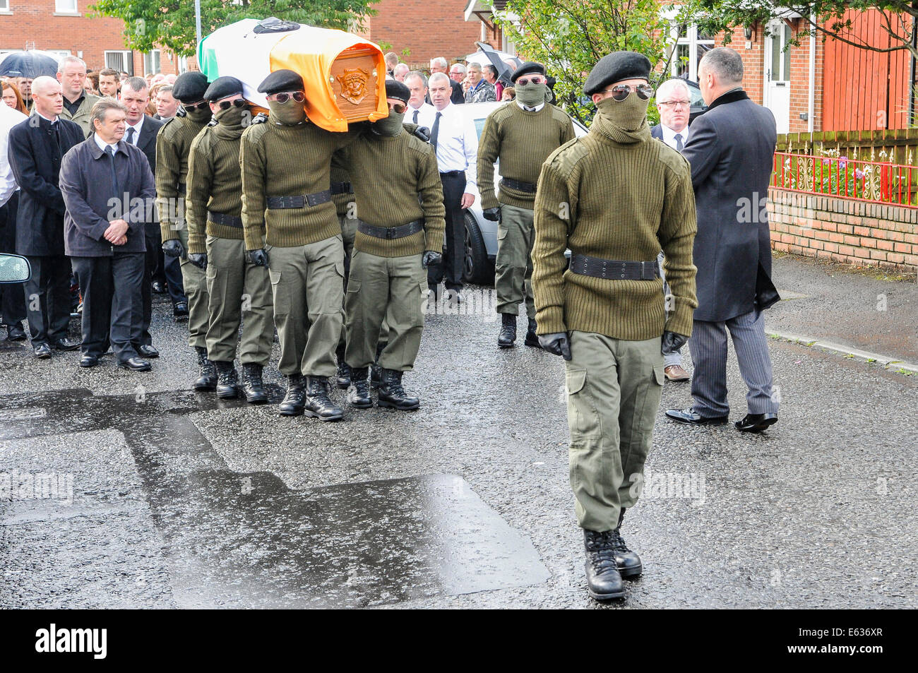 Belfast, Northern Ireland. 13 August 2014. Paramilitary funeral of veteran IRA volunteer Tony Catney Credit:  Stephen Barnes/Alamy Live News Stock Photo