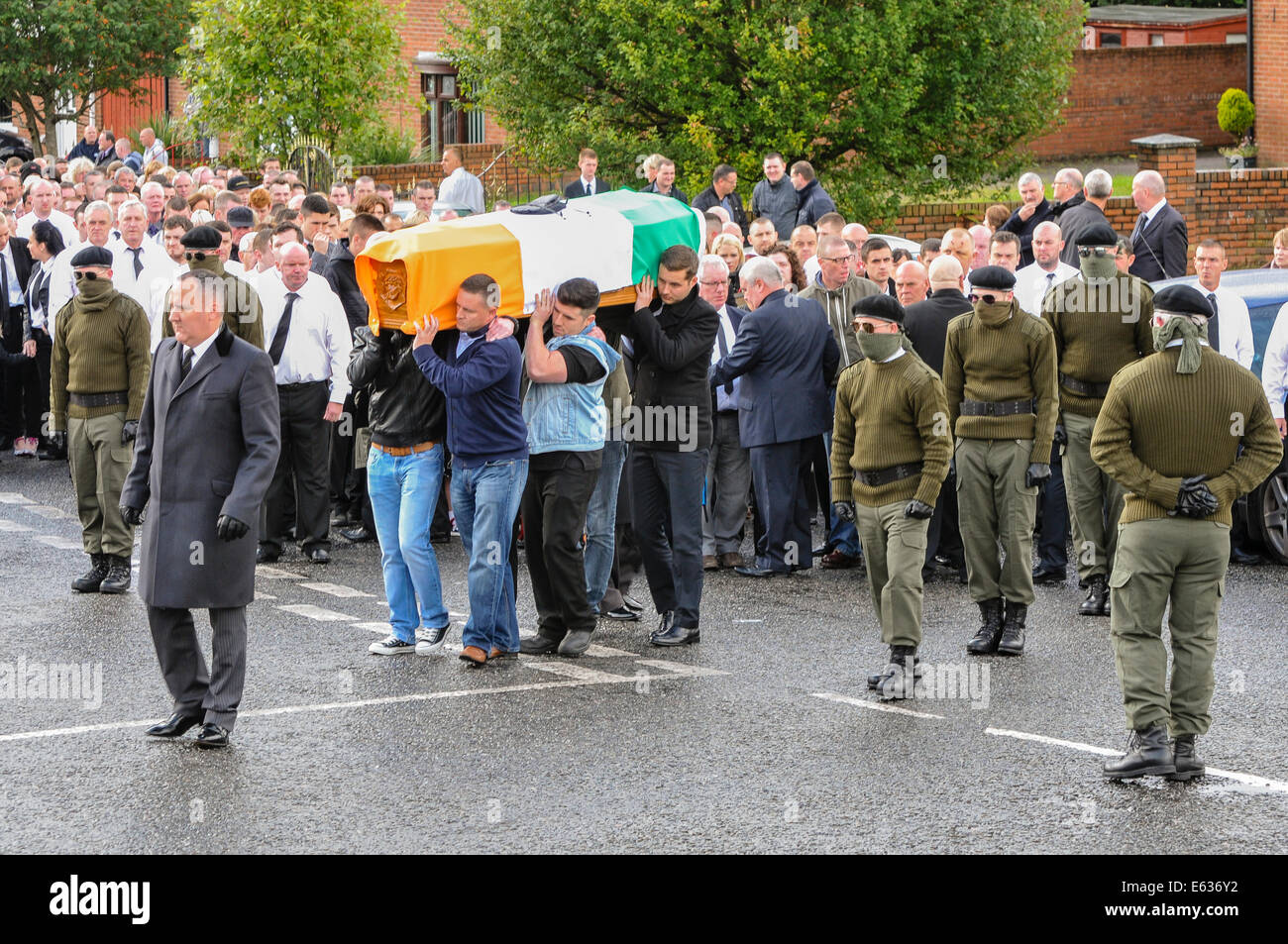 Belfast, Northern Ireland. 13 August 2014. Paramilitary funeral of veteran IRA volunteer Tony Catney Credit:  Stephen Barnes/Alamy Live News Stock Photo