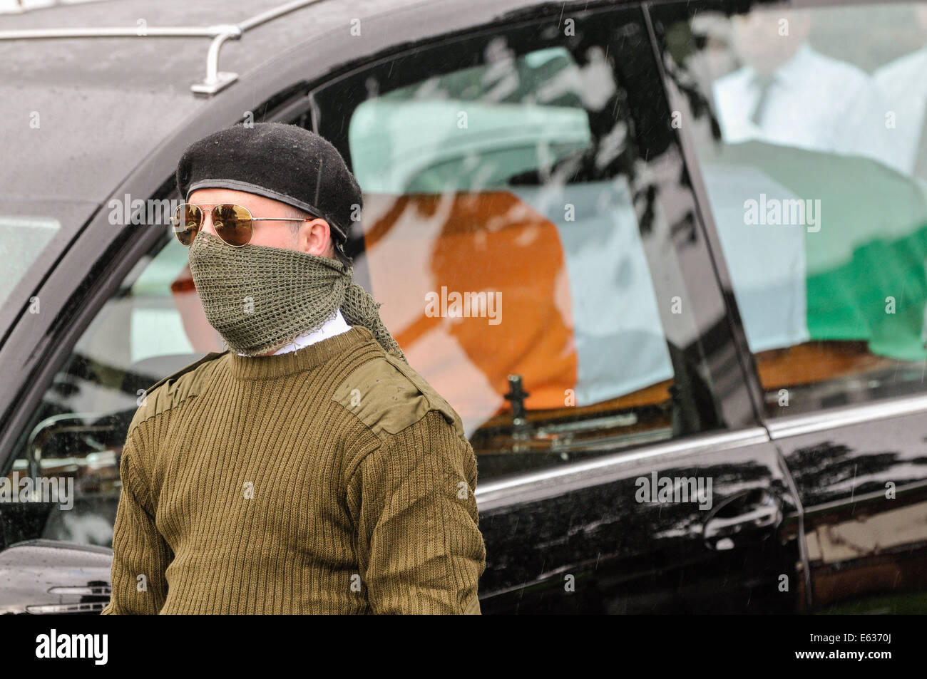 Belfast, Northern Ireland. 13 August 2014. Paramilitary funeral of veteran IRA volunteer Tony Catney Credit:  Stephen Barnes/Alamy Live News Stock Photo