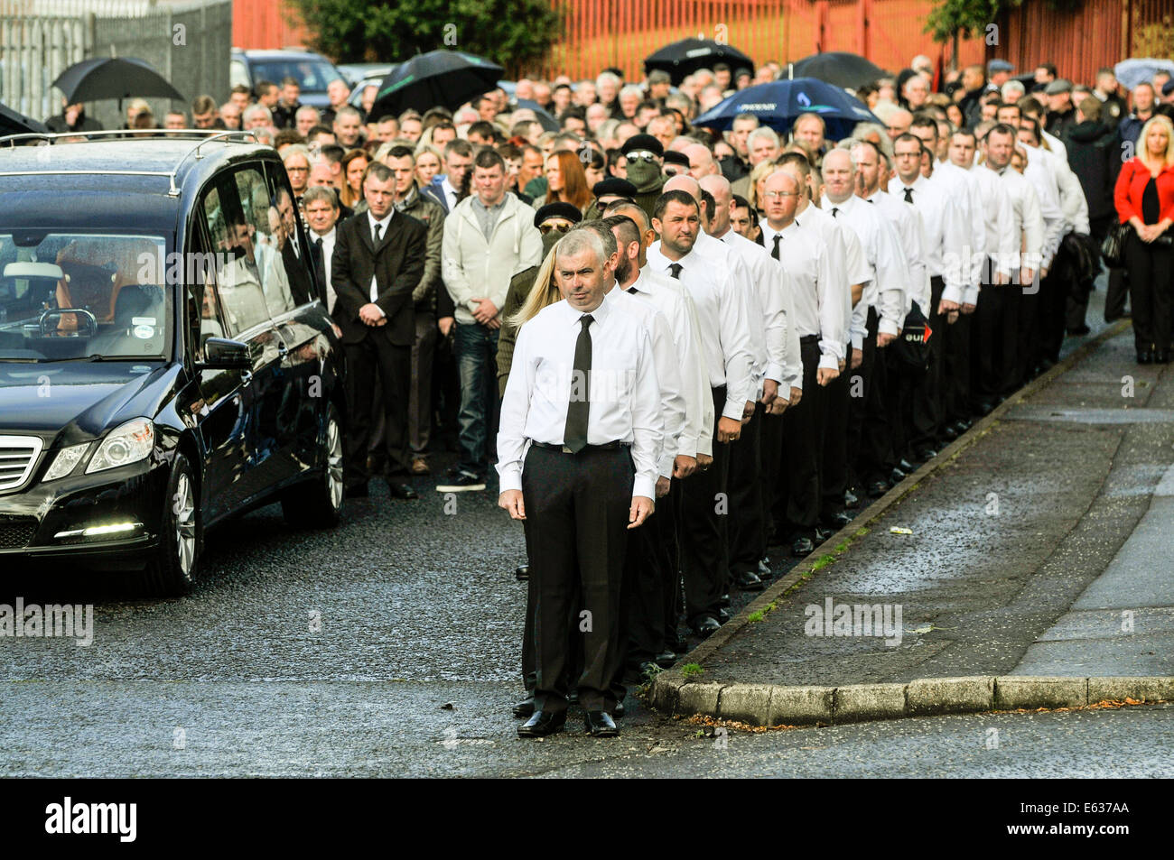 Belfast, Northern Ireland. 13 August 2014. Paramilitary funeral of veteran IRA volunteer Tony Catney Credit:  Stephen Barnes/Alamy Live News Stock Photo