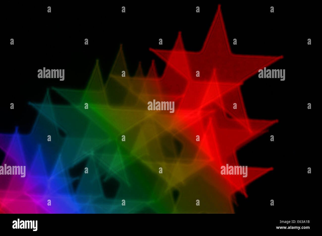 Colorful stars on black background abstract blurry lights. Stock Photo