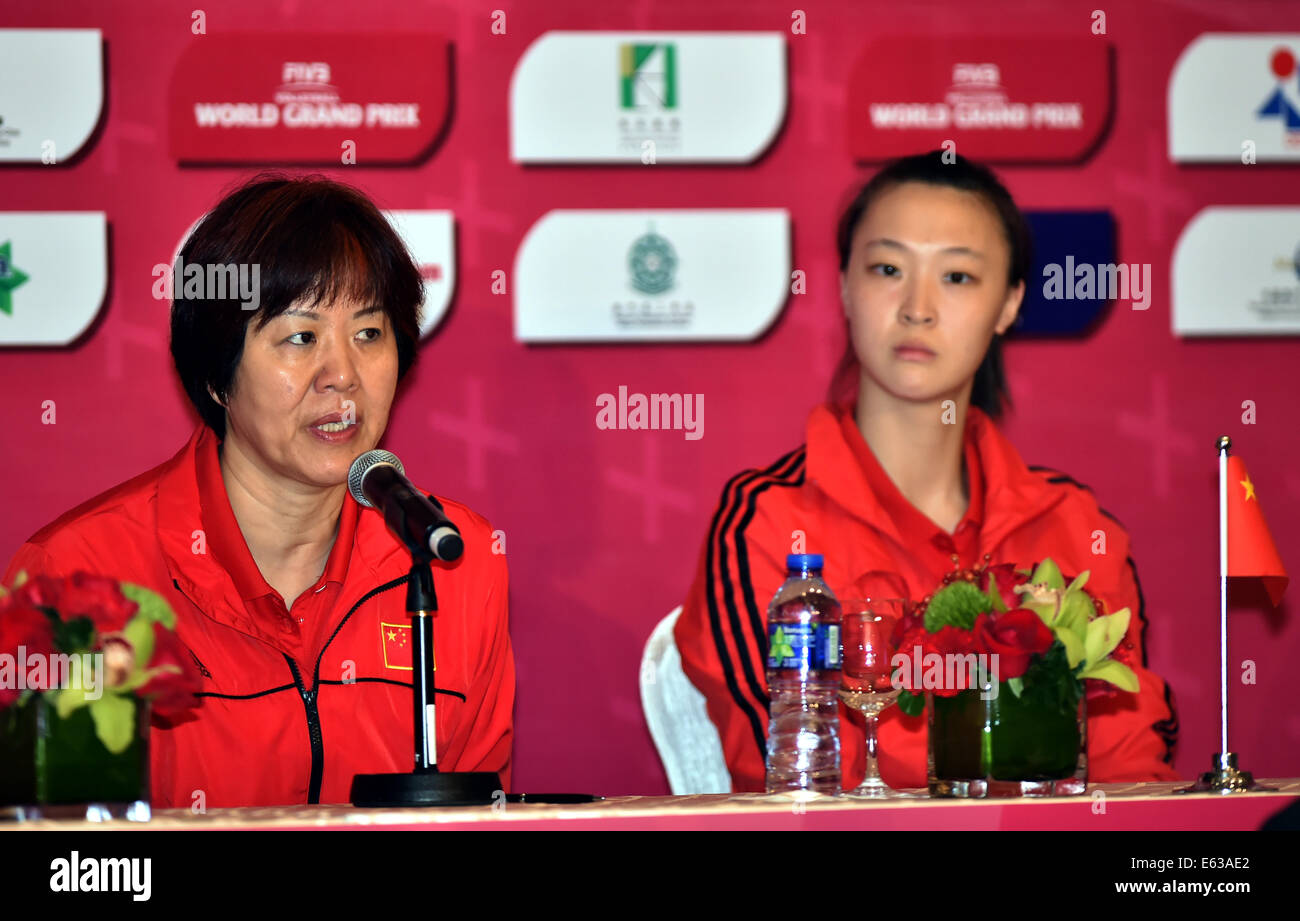 Macao, China. 13th Aug, 2014. China's head coach Lang Ping (L) and captain Hui Ruoqi attend a press conference for the 2014 FIVB Women's Volleyball World Grand Prix in Macao, south China, August 13, 2014. Teams of China, Japan, South Korea and Serbia will take part in the event from August 15 to 17. © Lo Ping Fai/Xinhua/Alamy Live News Stock Photo