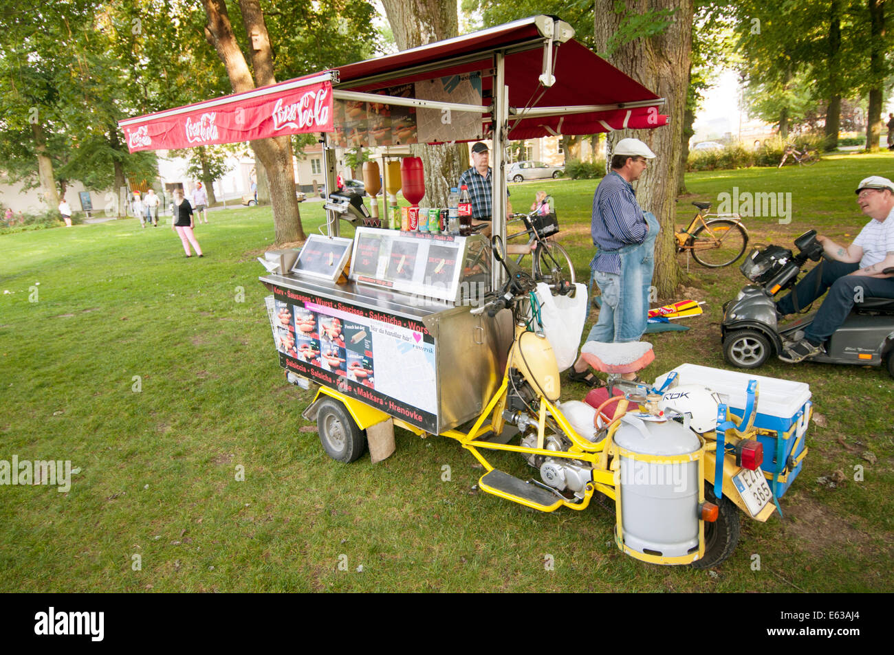 hot dog dogs hotdog hotdogs stand vendor moped powered stands sweden swedish vendors mobile Stock Photo