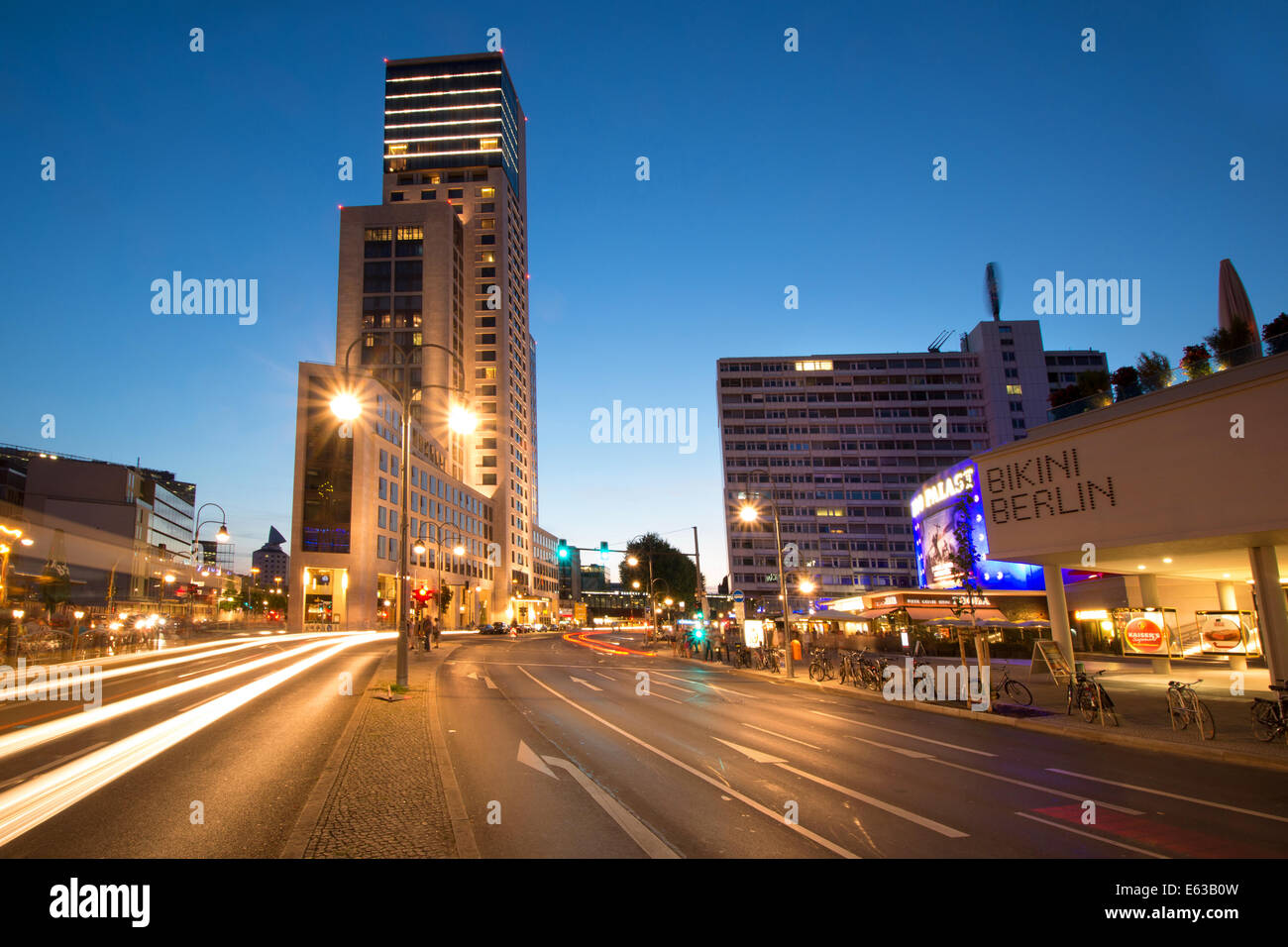 Berlin Zoologischer Garten with Hotel Waldorf Astoria and shopping mall Bikini house during night Stock Photo