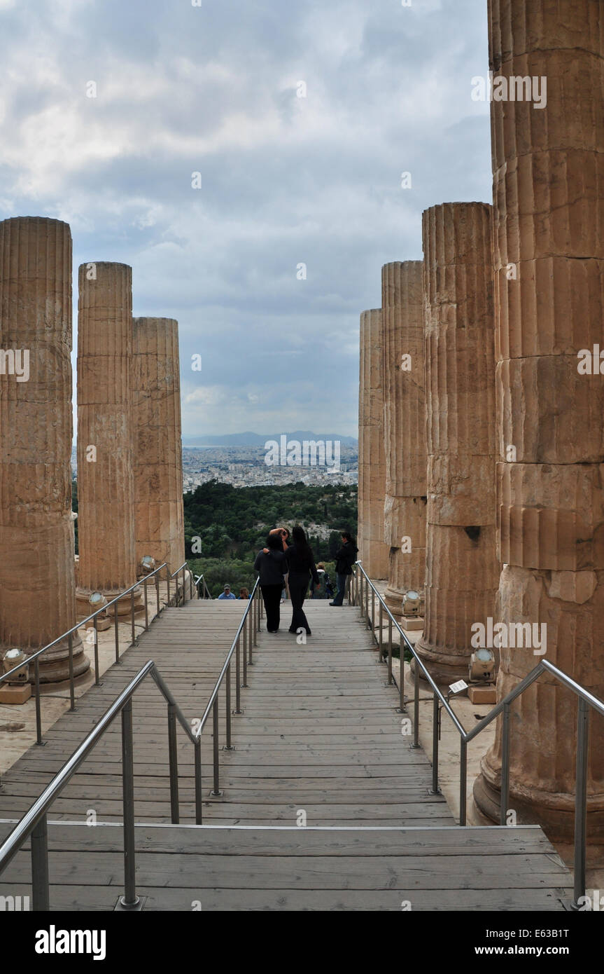 Propylea of Acropolis and distant view of the city of Athens, Greece. Stock Photo