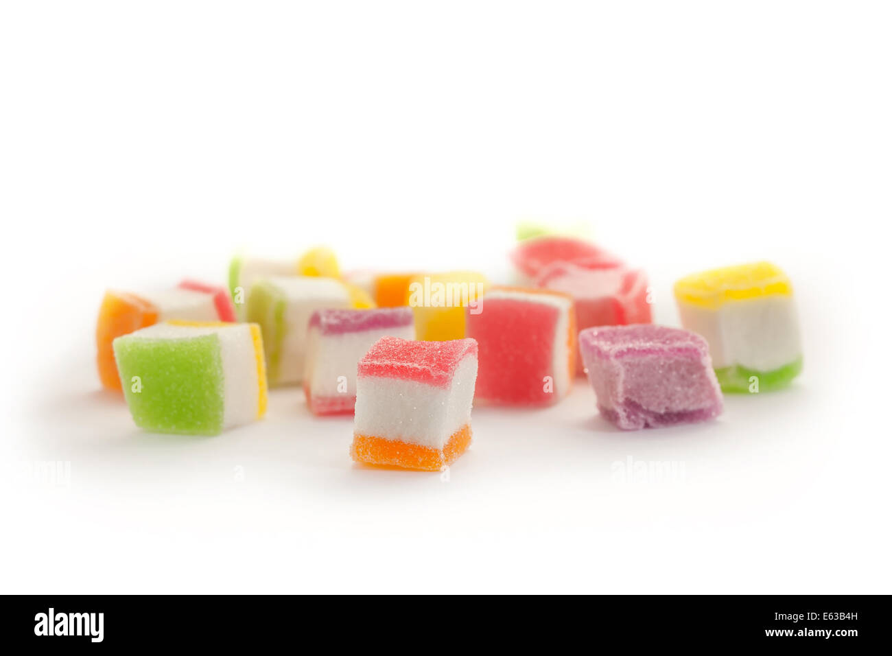 Sugar candies on white background Stock Photo - Alamy