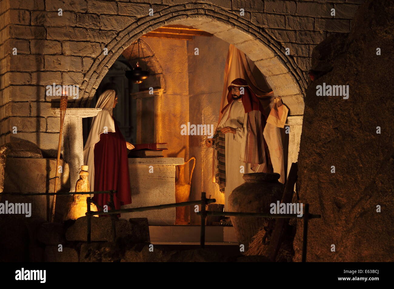 Holy family with the infant jesus in the crib hires stock photography