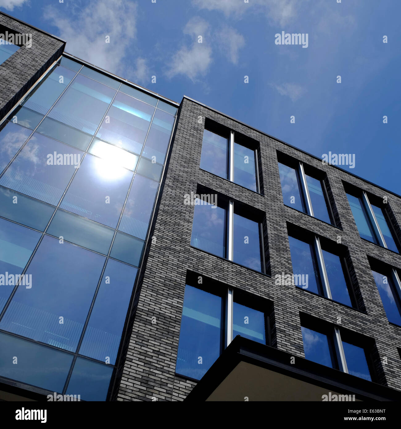 sky reflected in office building windows Stock Photo - Alamy