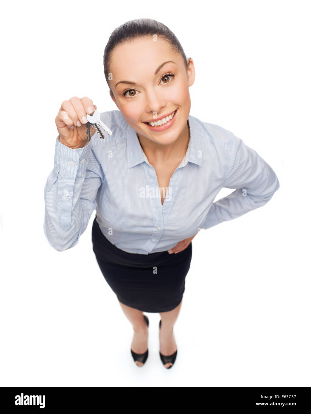 smiling businesswoman with house keys Stock Photo - Alamy