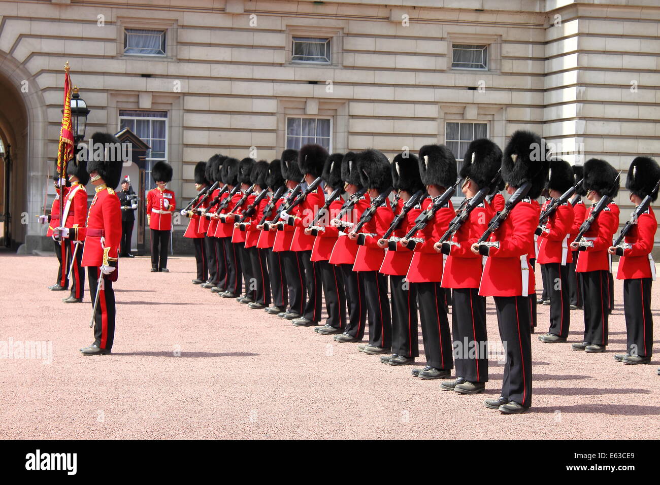 LONDON - MAY 21: British Royal guards performs the Changing of the Guard in Buckingham Palace on May 21, 2010 in London, UK Stock Photo