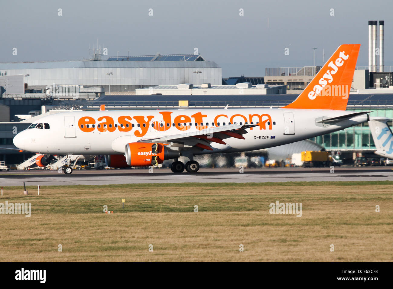EasyJet Airbus A319 decelerates on runway 23R at Manchester airport. Stock Photo