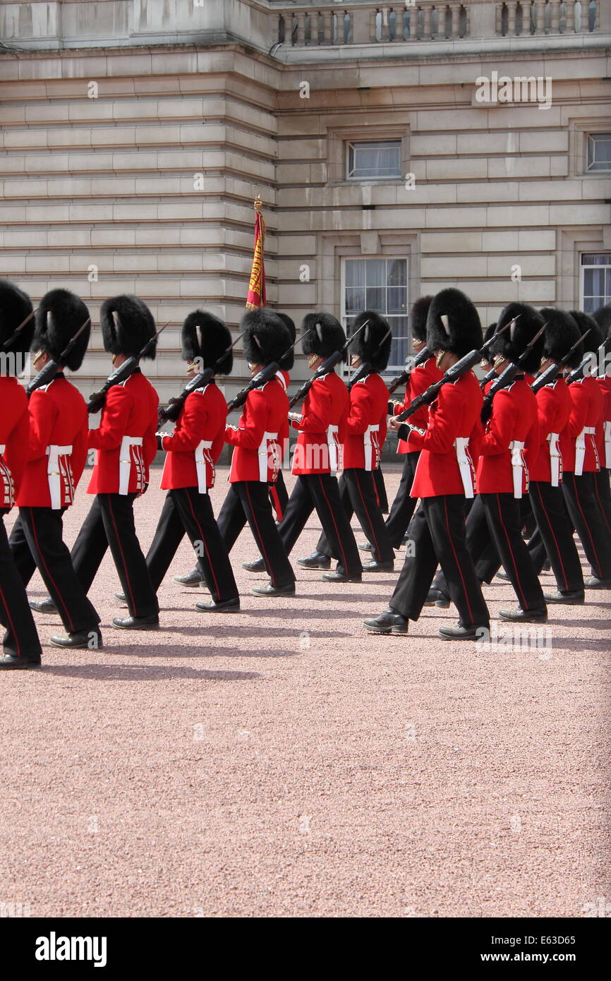 LONDON - MAY 21: British Royal guards performs the Changing of the Guard in Buckingham Palace on May 21, 2010 in London, UK Stock Photo