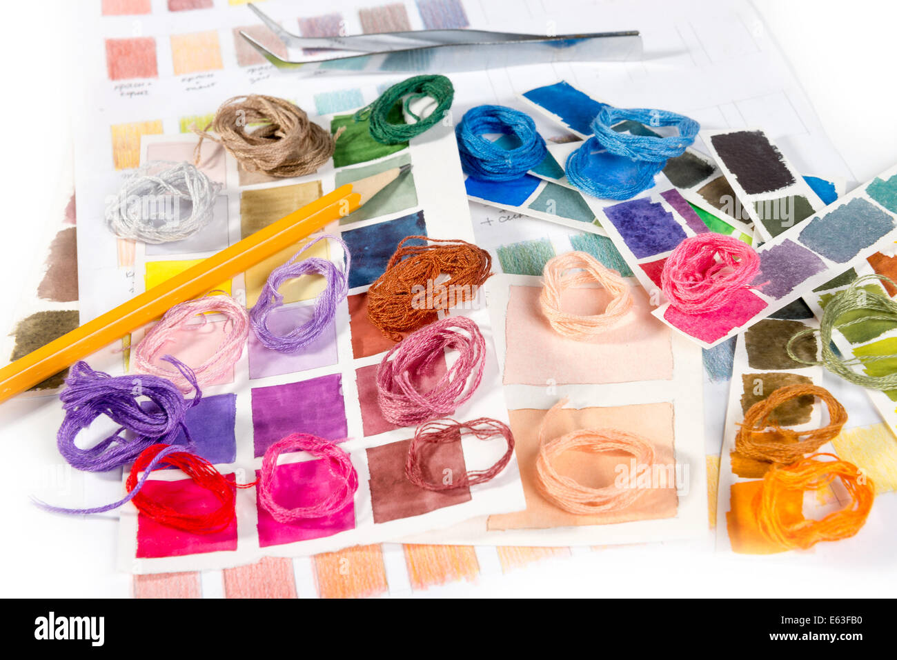 Needlework. Embroidery. Match colors of thread on the sketches of the