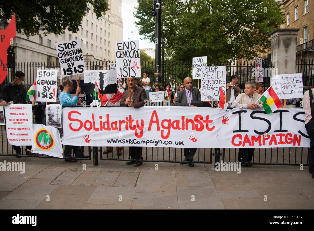 London, August 13th 2014. Dozens of London's Kurdish and Yazidi community demonstrate outside the gates of Downing Street against the unfolding genocide against their people in Iraq by terror organisation ISIS, now known as the 'Islamic State'. Credit:  Paul Davey/Alamy Live News Stock Photo