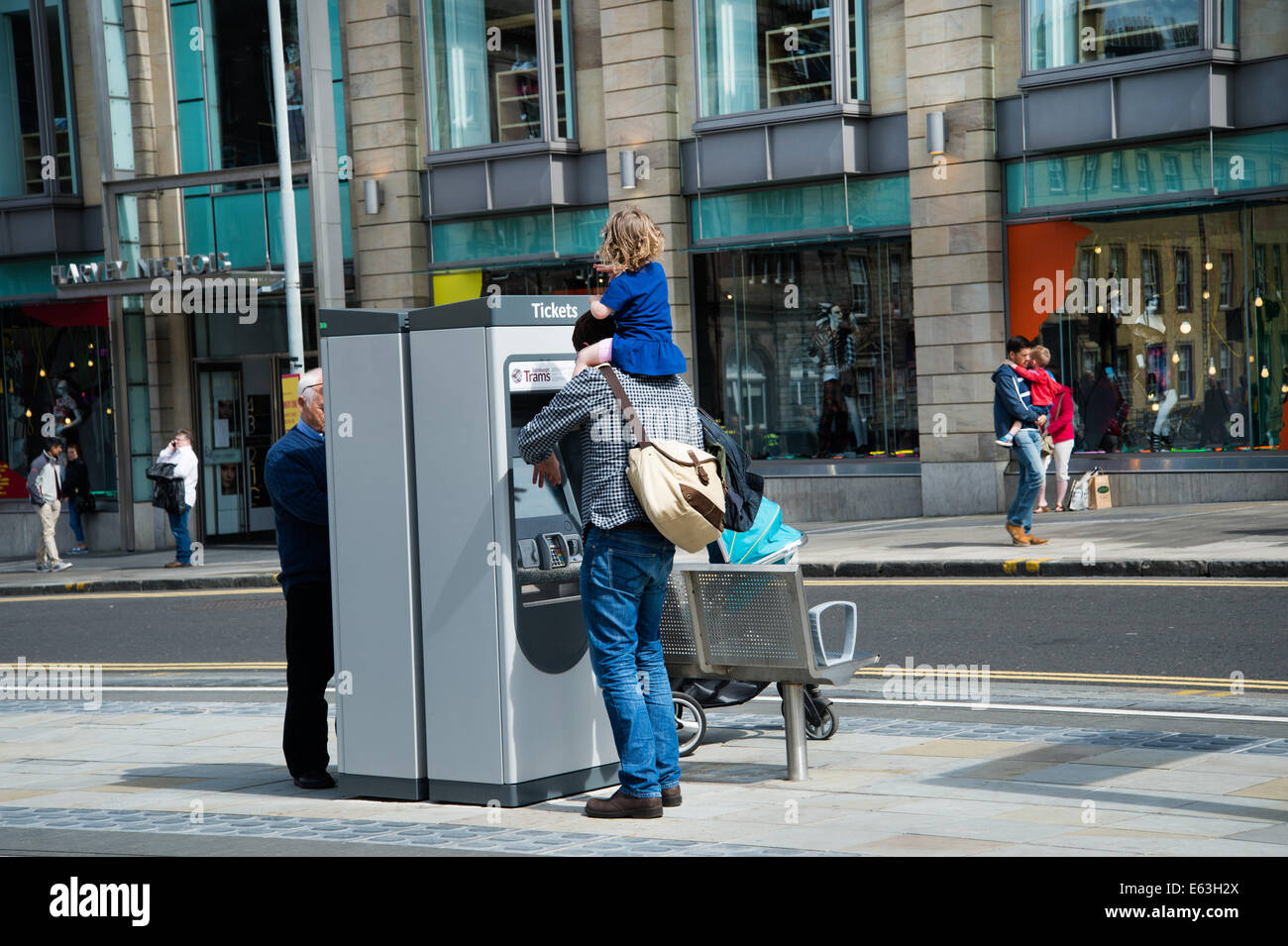 Man buys tram ticket hi-res stock photography and images - Alamy