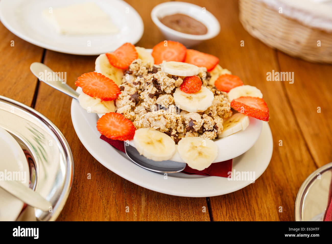 Chocolate cereals with banana and strawberries Stock Photo