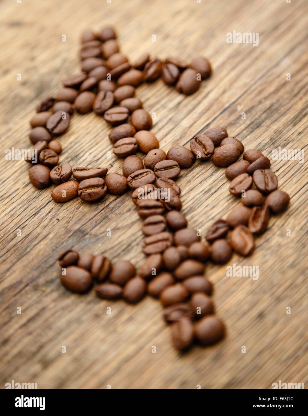 Coffee dollar sign created from coffee beans Stock Photo Alamy
