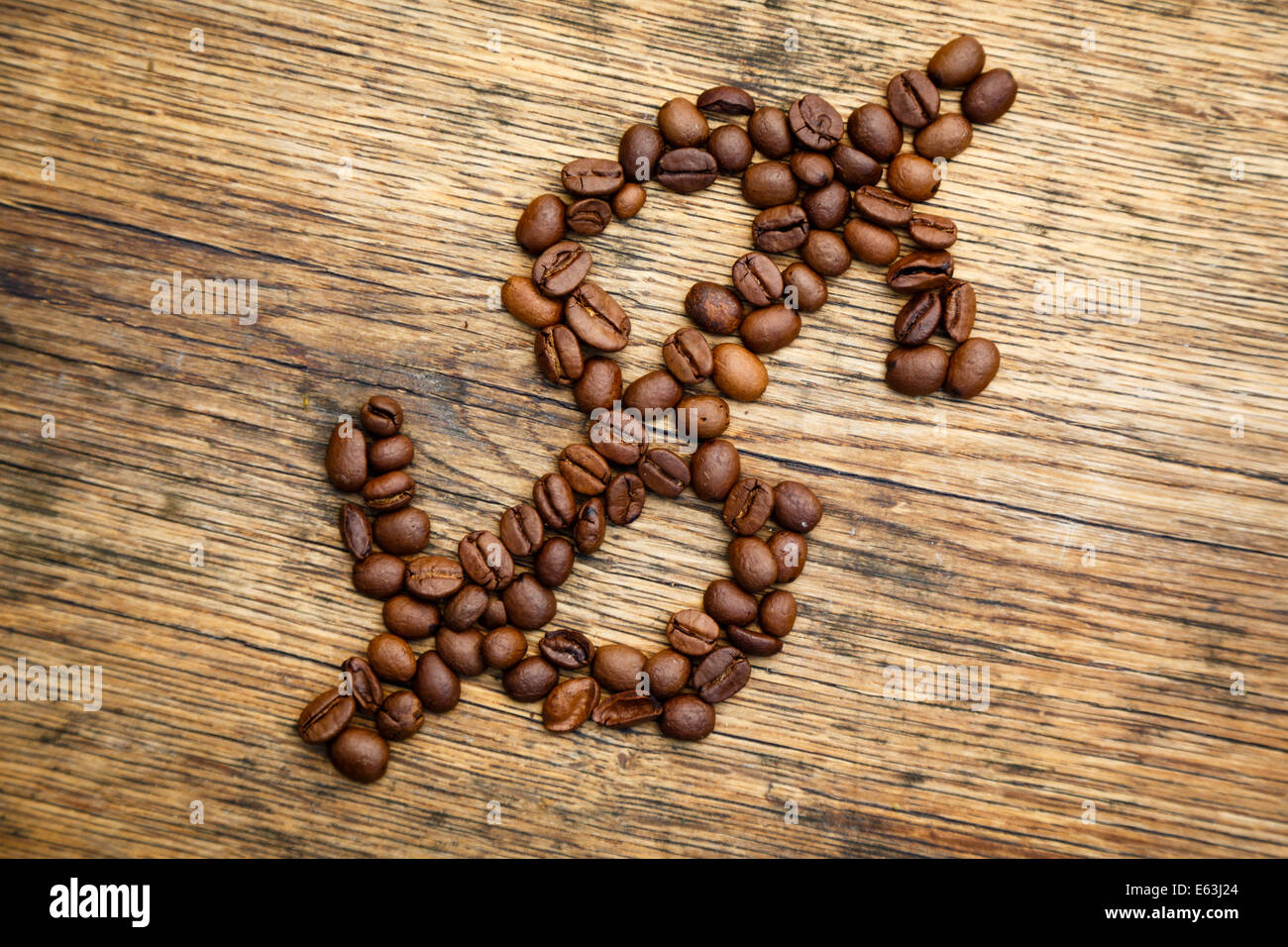 Coffee dollar sign created from coffee beans Stock Photo Alamy