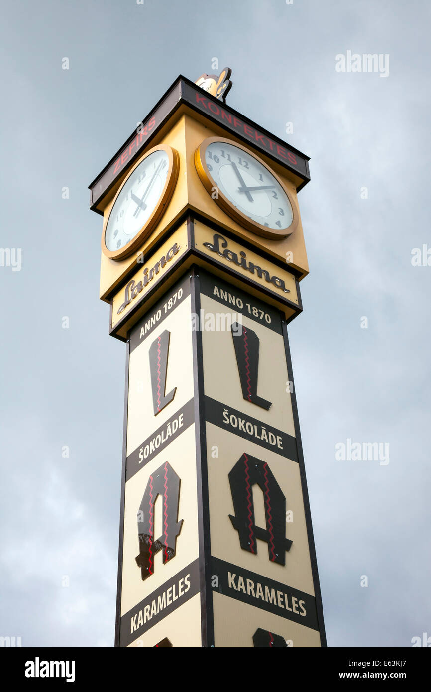 Riga, Latvia - Laima clock tower in Old Town of Riga marks the central meeting point in the city Stock Photo