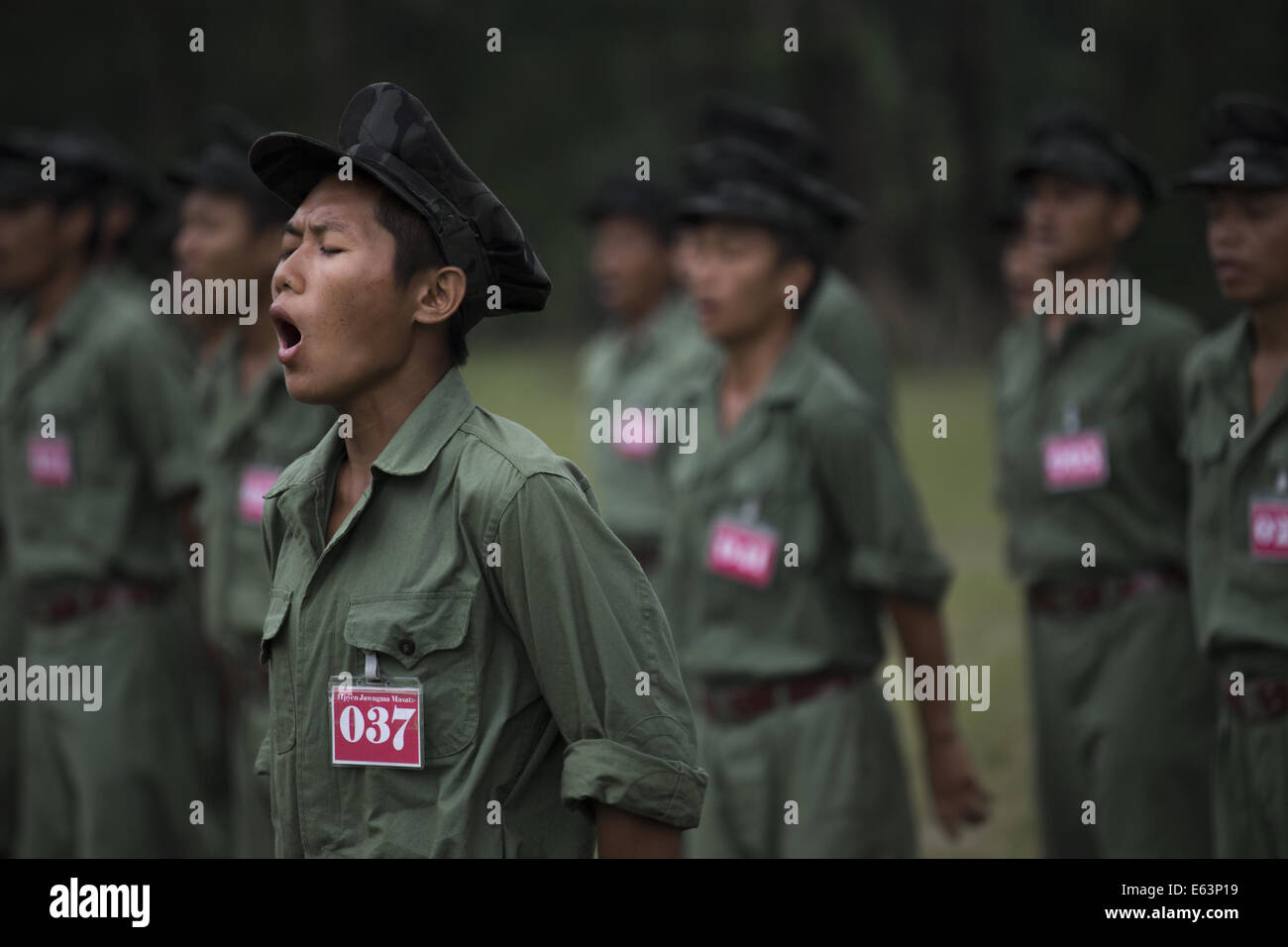 Laiza, Kachin, Myanmar. 8th July, 2014. KIA recruits take part in field exercises at a training camp. (Credit Image: © Taylor Weidman/zReportage.com via ZUMA Press) Stock Photo