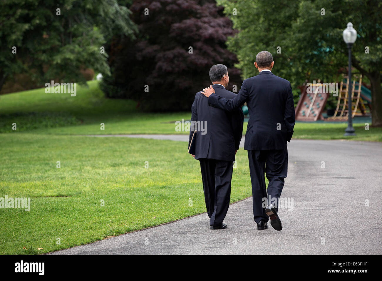 President Barack Obama walks with Veterans Affairs Secretary Eric K. Shinseki along the South Driveway of the White House, May 30, 2014. The President accepted Shinseki's resignation and named Sloan D. Gibson, United States Deputy Secretary of Veterans Af Stock Photo