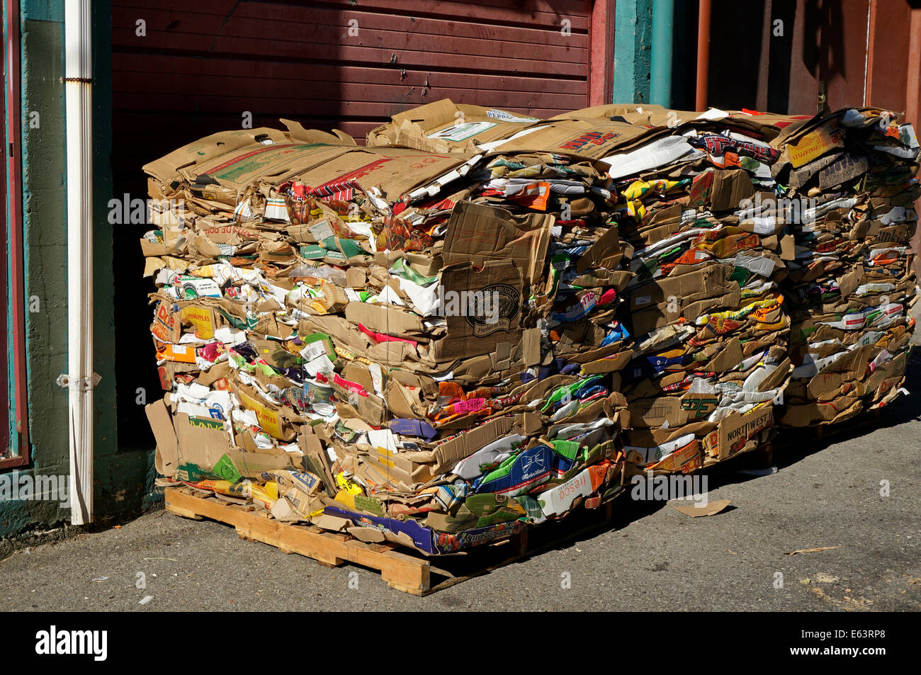 Stacks of compressed cardboard packing boxes on wooden pallets or skids,  Vancouver, BC, Canada Stock Photo - Alamy