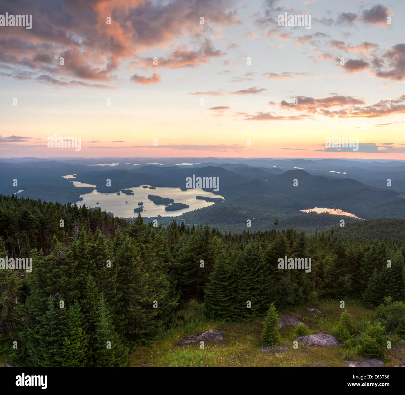 Colorful summer sunset view from the Blue Mountain Fire Tower in the Adirondacks Mountains of New York Stock Photo