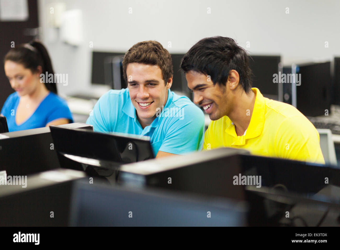 happy college students learning computer skills Stock Photo - Alamy