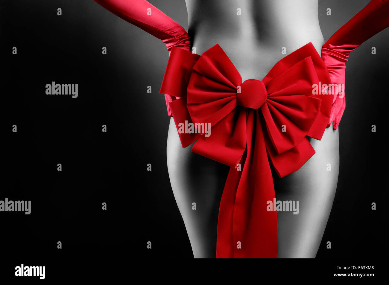 Black woman red bow naked Sexy Woman Nude Body With A Red Christmas Bow And Gloves Isolated On Black Background Stock Photo Alamy