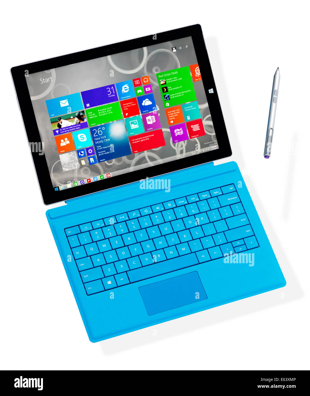 Microsoft Surface Pro 3 tablet computer with a pen suspended in mid-air isolated on white background Stock Photo