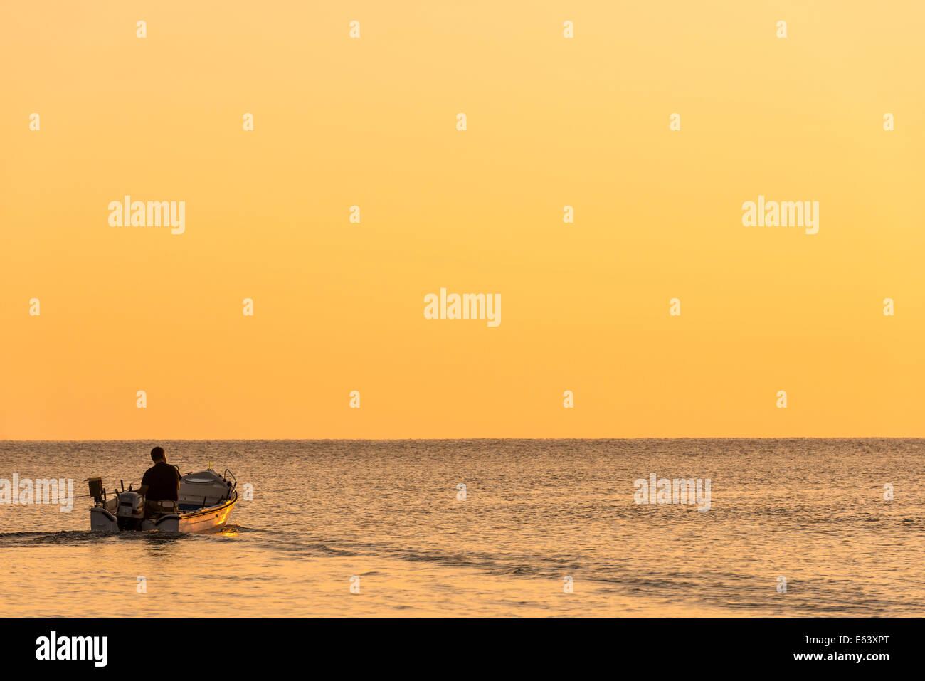 Moving Motorboat At The Mediterranean Sea in Crete, Greece Stock Photo
