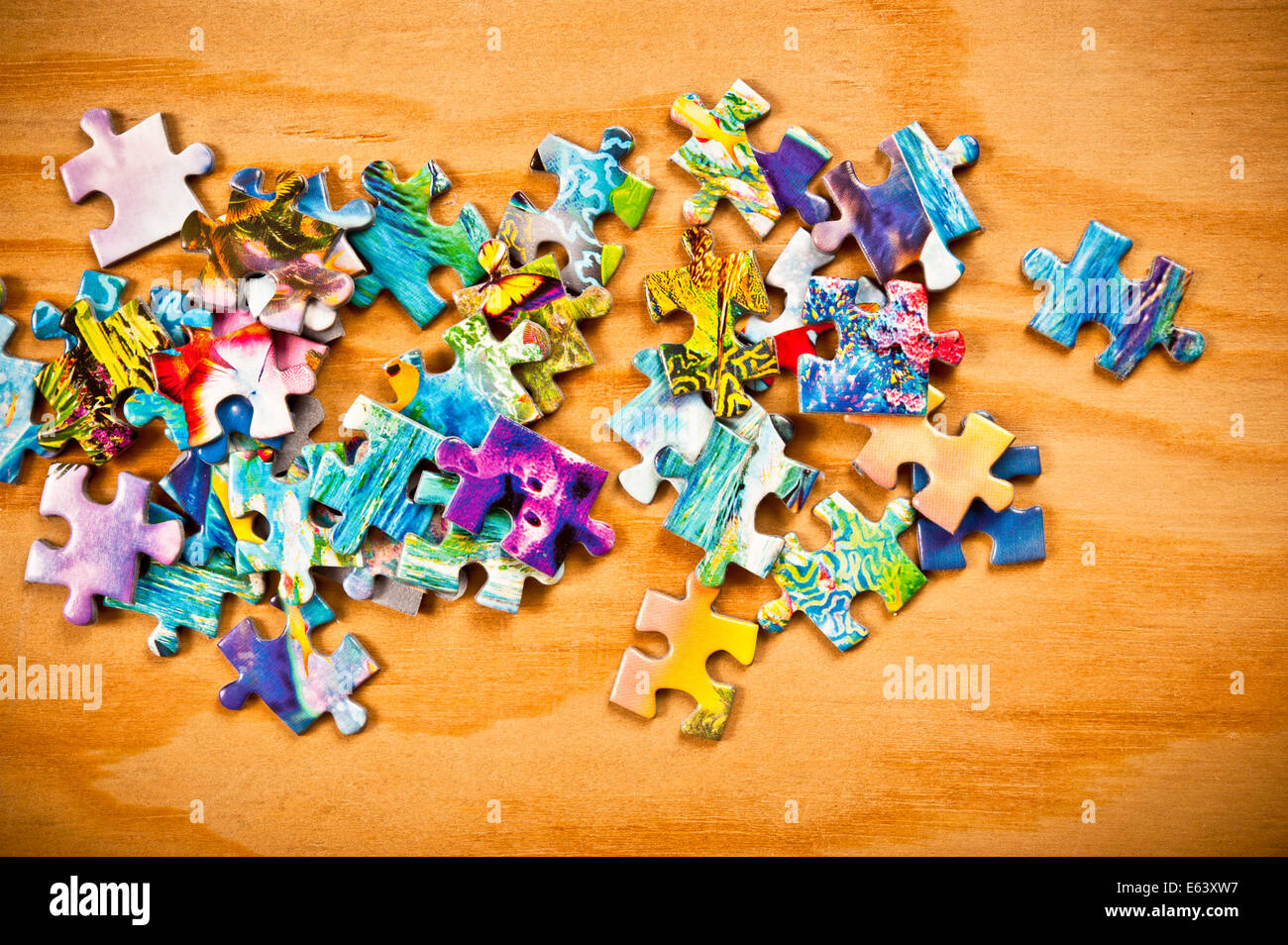 jigsaw puzzle pieces scattered Stock Photo
