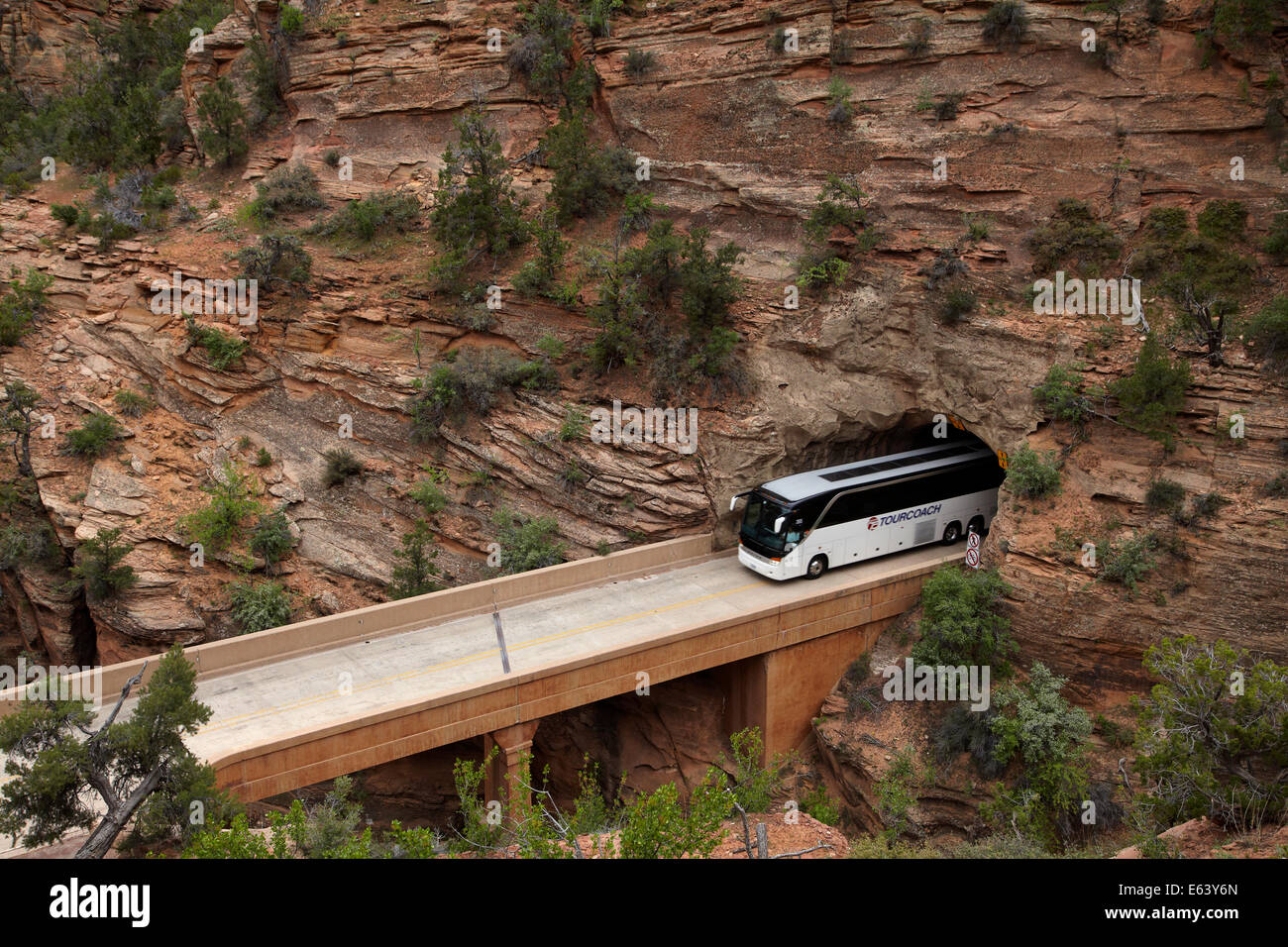 Bus exiting east portal of Zion Tunnel, Zion – Mount Carmel Highway, Zion National Park, Utah, USA Stock Photo